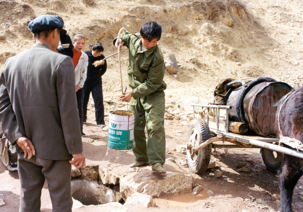 Drawing-water-from-hole---Shanxi-province-min